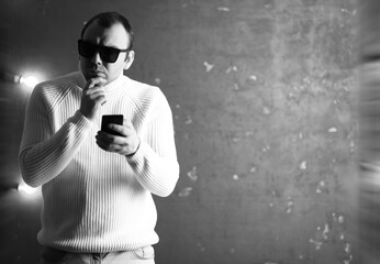 Fototapeta premium A man in a white sweater