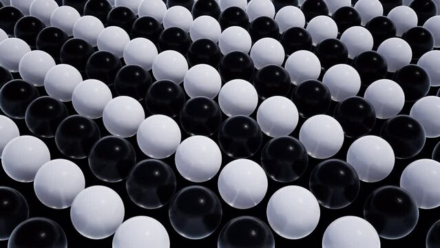 Moving Black and White Sphere Lined up side by side