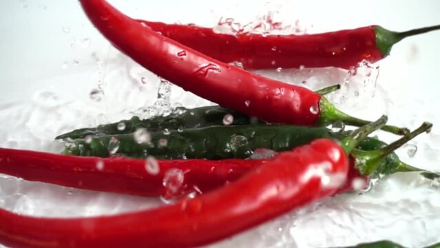 Fresh chili pepper. Slow motion.