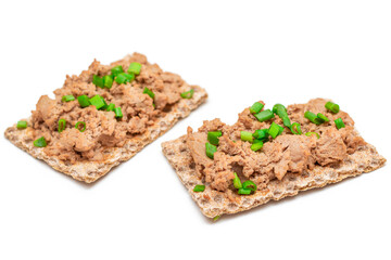 Crispy Sandwich with Chicken Pate and Green Onions Isolated on White Background - Top View. Whole Grain Bread with Liver Pate. Diet Breakfast and Healthy Food