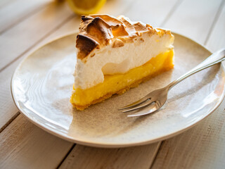 Lemon tart on wooden table
