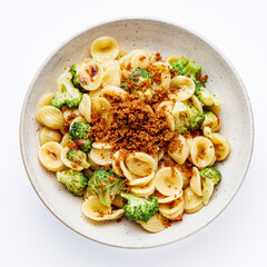 orequette pasta with broccoli on a white background