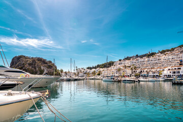 Bay area situated in la provincial de Granada. Beautiful harbour with luxury yachts docked in a...
