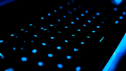 Side view of a blue gaming keyboard