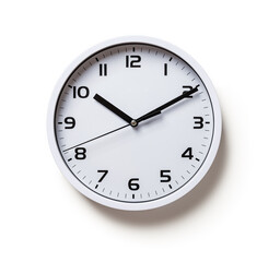 Wall clock isolated on a white background. Round white clock with black hands cutout. Ten minutes past ten. Time control, time measuring, hour and minutes concepts.