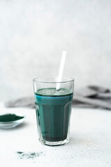 detox smoothie from spirulina algae in a tall glass