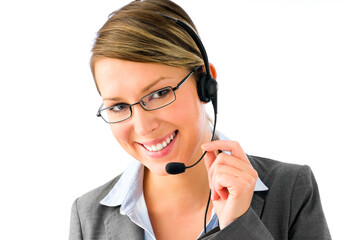 Always here to help. Shot of a businesswoman working in a call center posing against a studio background.