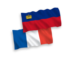 National vector fabric wave flags of France and Liechtenstein isolated on white background. 1 to 2 proportion.