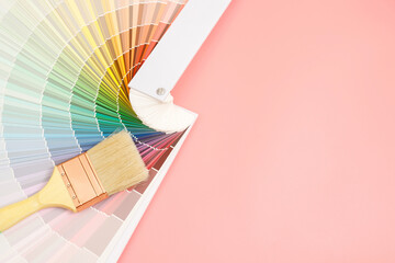 A painter is choosing a paint shade for the interior of the house's walls. with interior