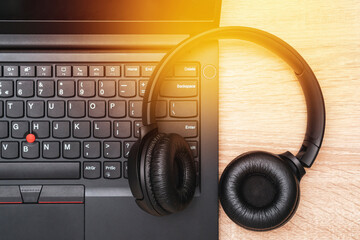 Professional headphones on the computer keyboard