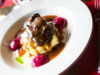 beef cheek with mashed potatoes and currant oil
