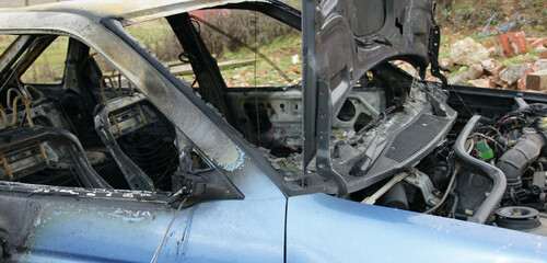 Ukraine Vehicles, civilian cars destroyed in the street by Russian Air raid attack. Russian...