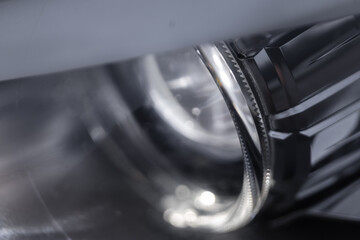 Led car headlight with light elements, close-up. Modern car