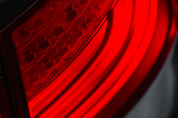 Red headlight element, close-up. car with taillights