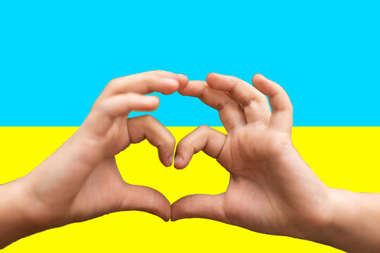 Love Ukraine concept. hands in heart form painted in Ukraine flag color - yellow and blue. Independence day of Ukraine, Flag, Constitution day Education, school, art painitng concept