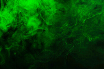 Green steam on a black background.