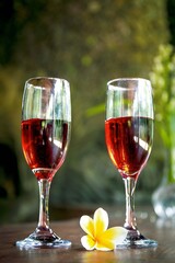 two glasses of wine on the table