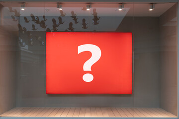 A question, a question mark on a red billboard