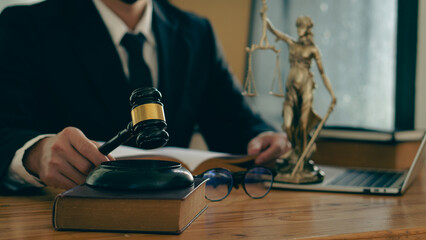 Lawyer's office with judge's hammer and scales, god of justice, legal advisor concept