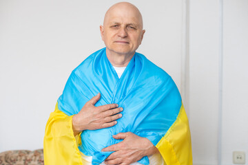 elderly man with ukraine flag