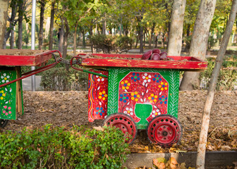 Fototapeta na wymiar Vendor wooden cart displayed in park, Tehran, Iran