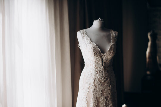 elegant wedding dress on a mannequin