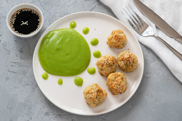 Fish meatballs with broccoli puree. Proper nutrition concept. Diet dish. Vegetarian food.