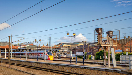 Trains at a station platform.