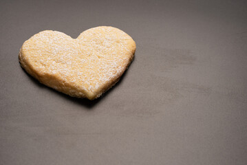 Shortbread in the shape of a heart isolated on white background.