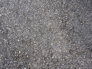 Asphalt textured background. Close-up of the pavement of a road