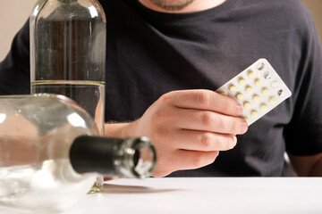 A man keeps hangover pills, alcohol treatment, alcohol dependence