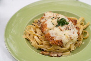 creamy fettucini carbonara with chicken katsu mozzarella