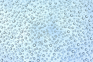 Rain drops on the car windshield after raining in rain season