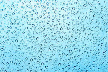 Rain drops on the car windshield after raining in rain season