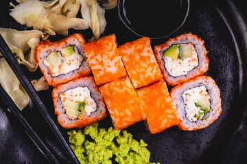 Fresh sushi rolls. Traditional Japanese food. Dinner party.