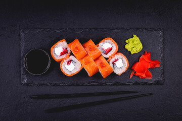Fresh sushi rolls. Traditional Japanese food. Dinner party.