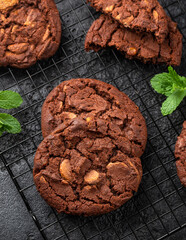 Chocolate, orange chip cookies on cooling rack