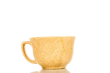 One ceramic cup, close-up, isolated on a white background.