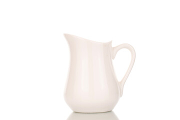 One ceramic milk jug, close-up, isolated on a white background.