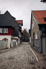 View on timbered houses and cobbled street in the historic old town of Goslar, Germany