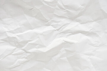 White crumpled paper texture background.