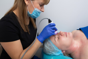 hardware facial massage in a beauty salon