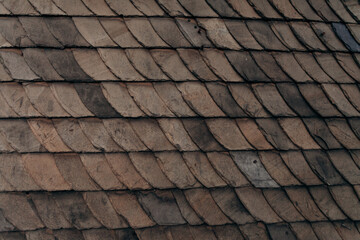 The texture of the roof of the roof, made of shingles. The texture of shingles. Background