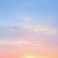 Clear blue sky. Pink and golden glowing clouds. Sunrise. Dramatic cloudscape. Concept art,...