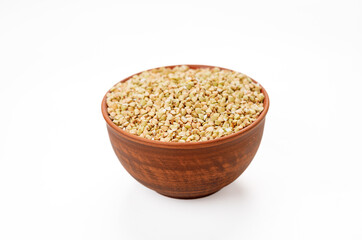 Buckwheat groats in bowls and bags isolated on a white background. High quality photo