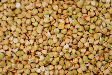 Buckwheat groats texture background. High quality photo