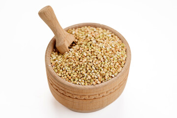 Buckwheat groats in bowls and bags isolated on a white background. High quality photo