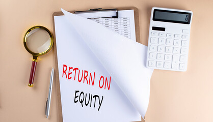 Clipboard with chart and text RETURN ON EQUITY with magnifier ,calculator on beige background
