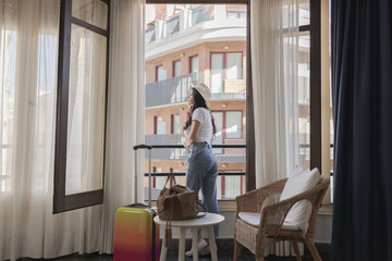 Traveling woman in a hotel