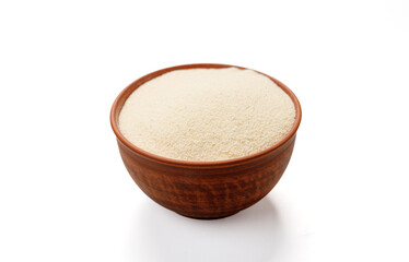 Semolina in bowls and bags isolated on a white background. High quality photo